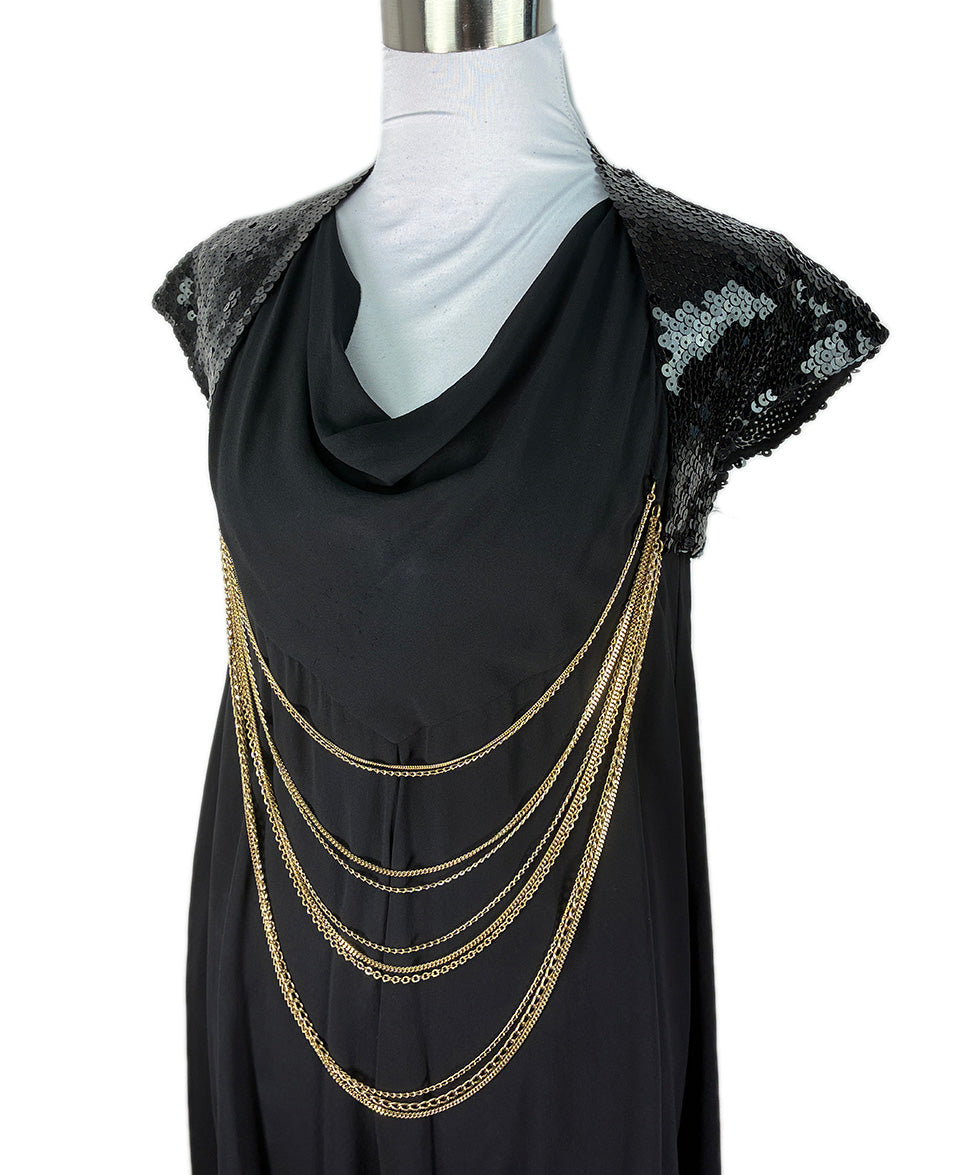 chanel black and gold chain dress iconic fashion moments: the chanel chain dress