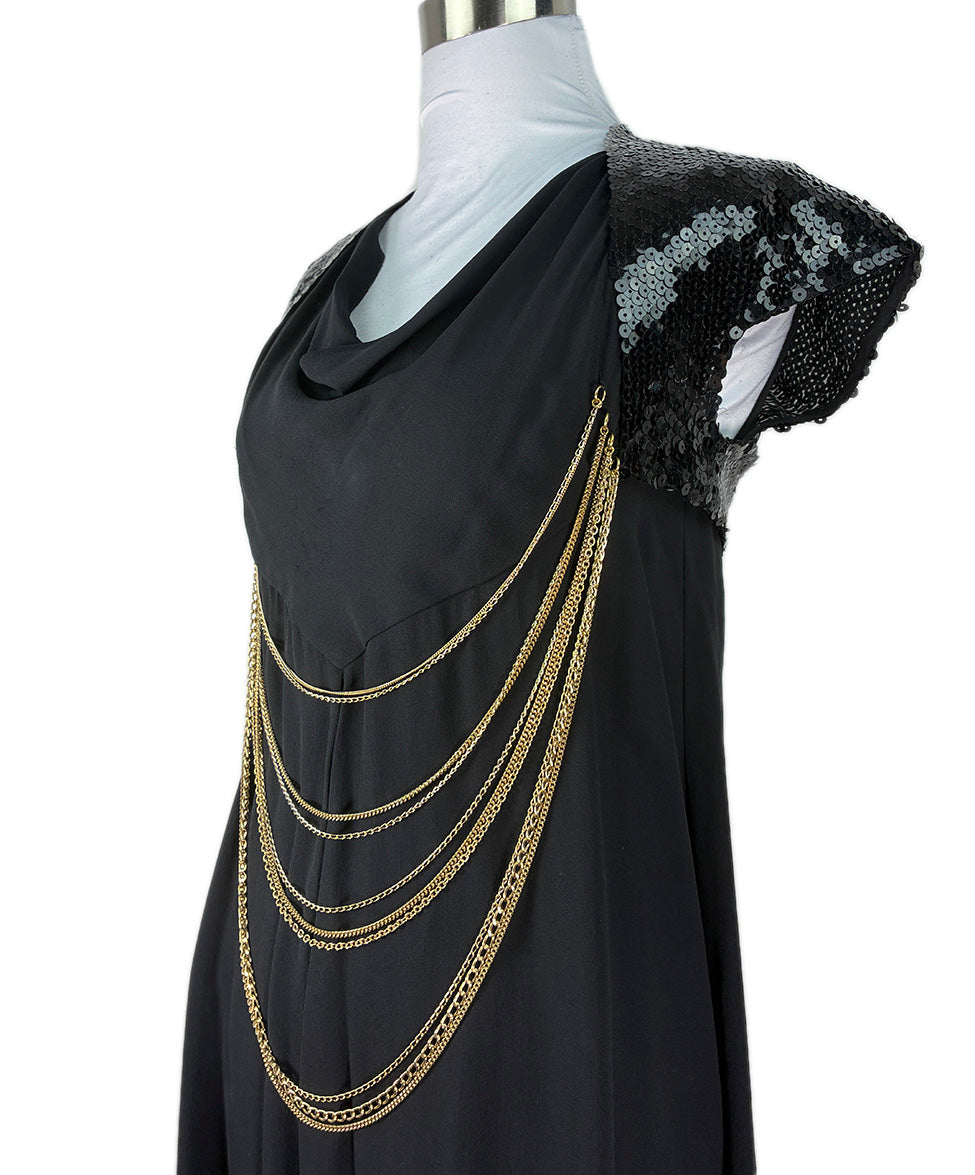 black dress with hole on chest with gold chain AKIRA Stand Out Chain Mini Dress | Black