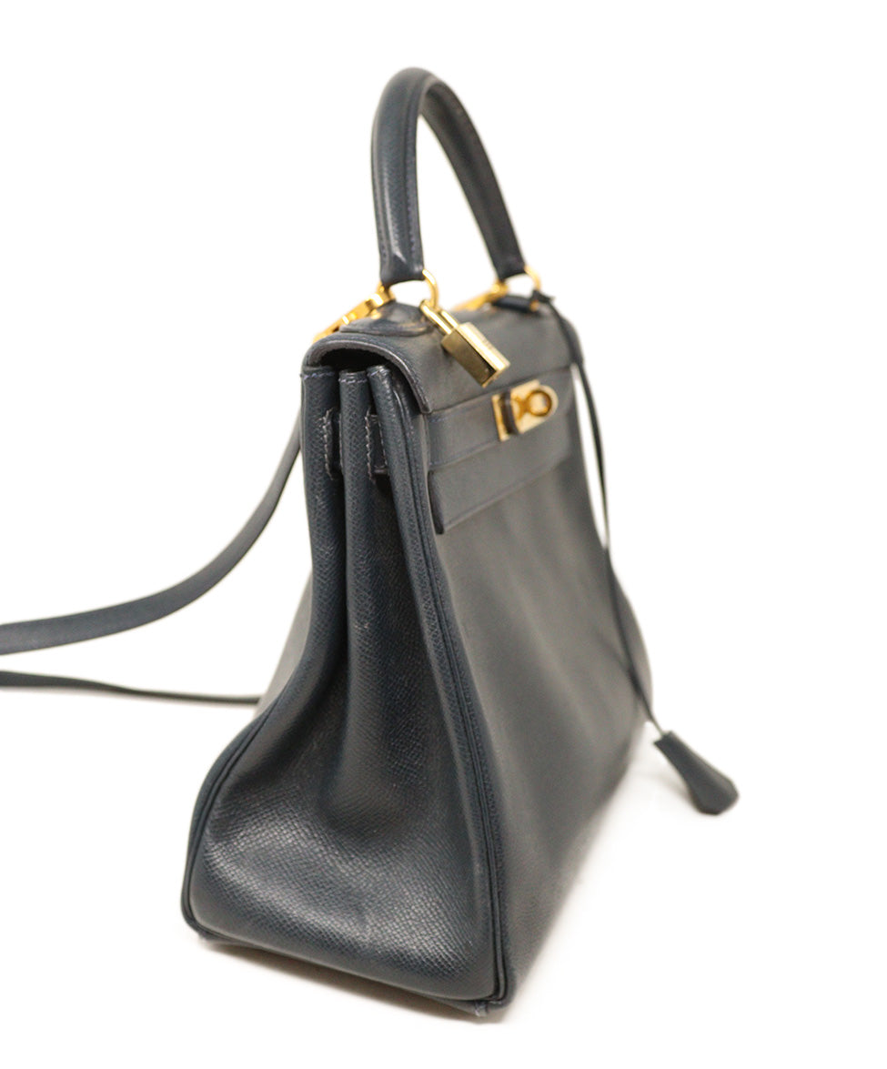 A NAVY BLUE LEATHER 'KELLY' BAG