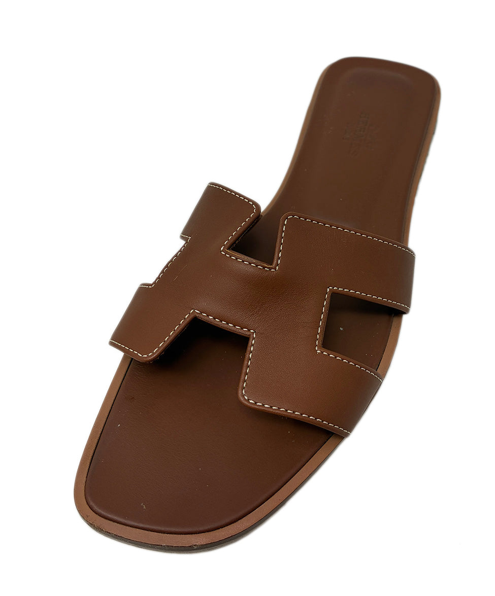 HERMES ブラウンレザーサンダル Hermes Oran Sandals in Brown Leather sz38 l Michael's Luxury